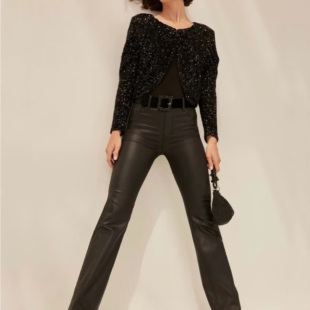 White House Black Market coated slim boot cut jeans. Black. Size 2